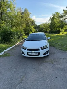Chevrolet Aveo T300. 2013 год. Пробег 215 тысяч. Д