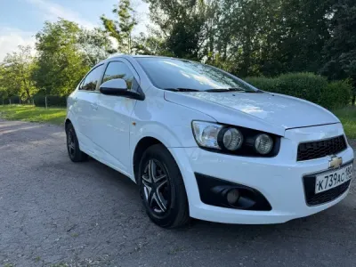 Chevrolet Aveo T300. 2013 год. Пробег 215 тысяч. Д